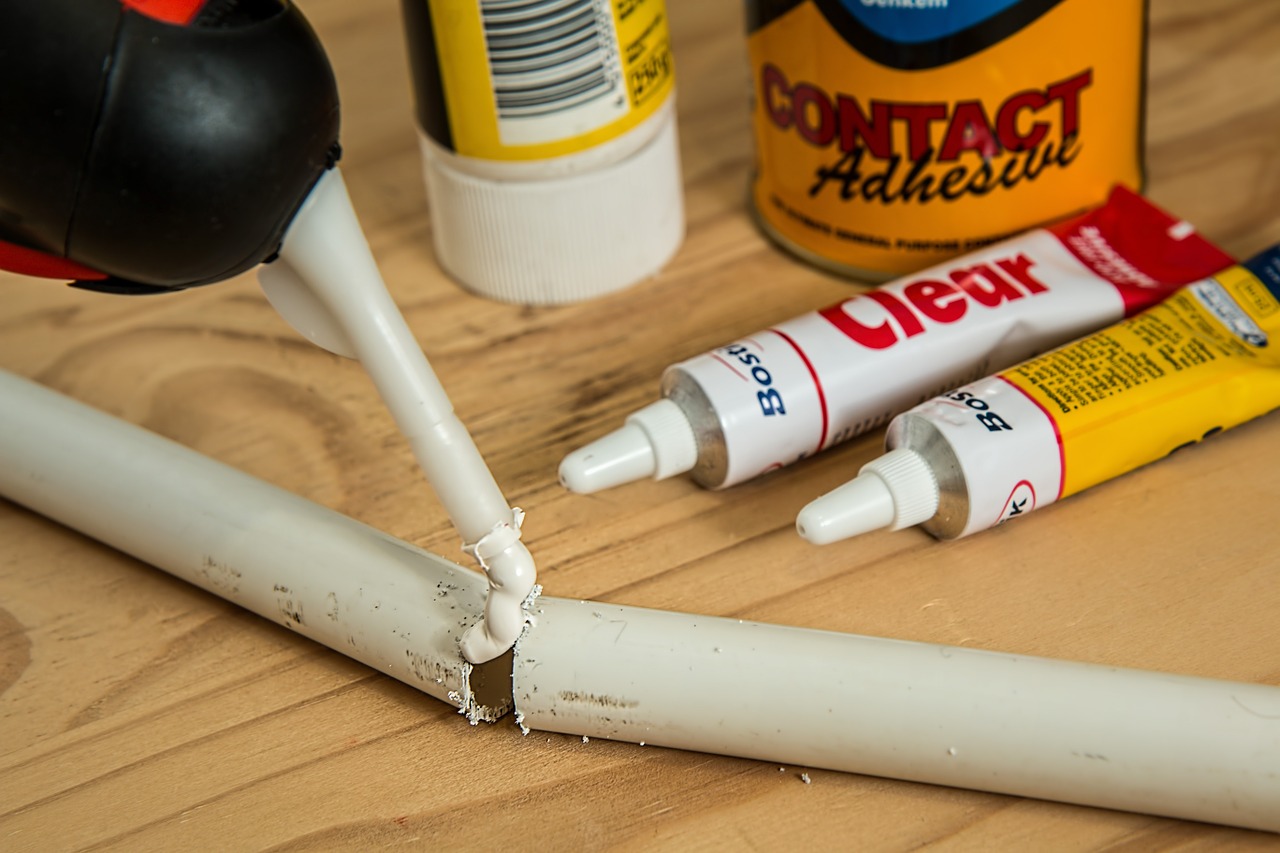 Broken plastic pipe with glue tubes