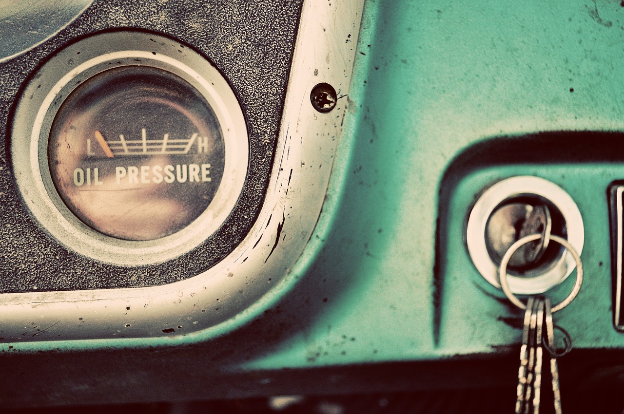 Closeup on oil pressure gauge on old car