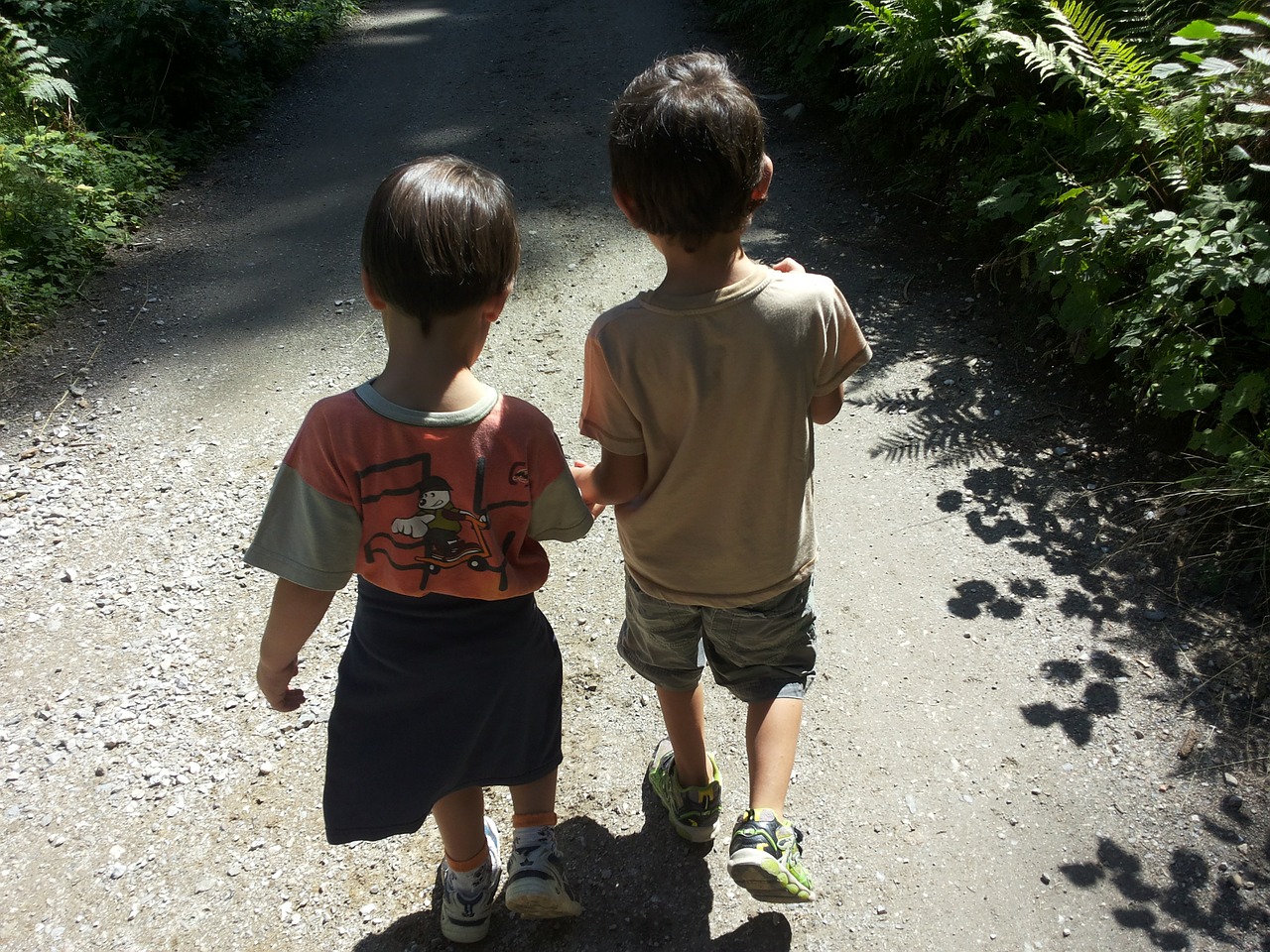 Two children walking together