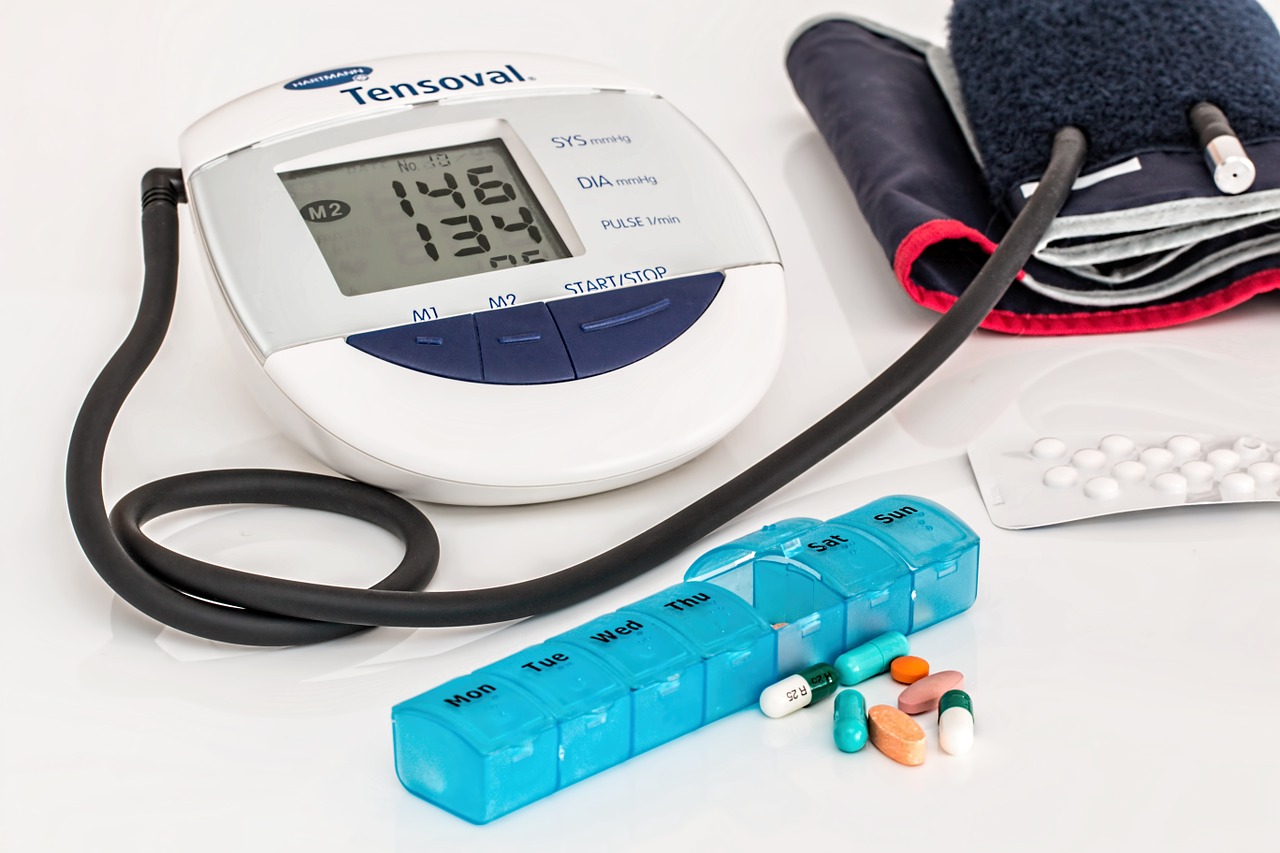 Blood pressure cuff with medications