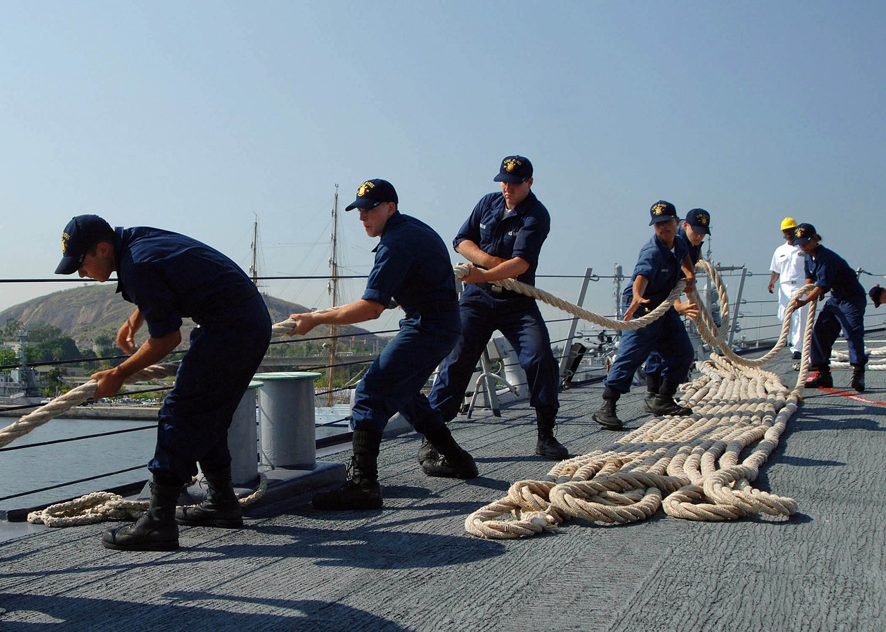 Sailors pulling on a rope